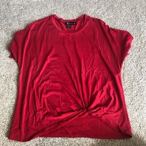 Red tee shirt with tie bottom